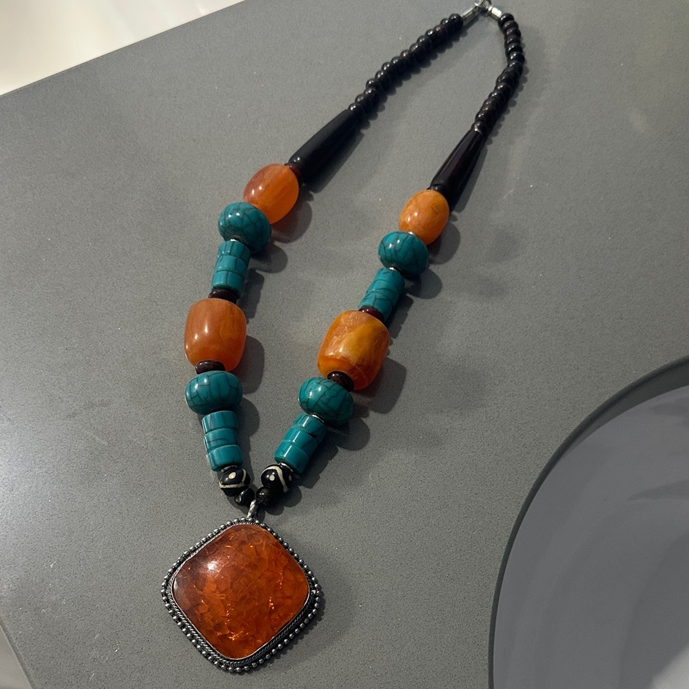 Elegant Beaded Necklace with Orange and Teal Accents